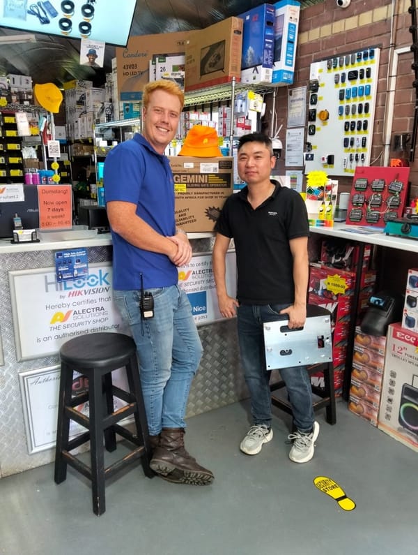 Alectra Solutions staff helping a customer
