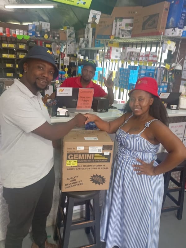 Customer picking up a Gemini gate motor